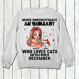 Personalized Never Underestimate A Woman Who Loves Cats And Was Born In December Tshirt Hoodie Or Sweatshirt Printed QTHQ0811