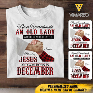Personalized Never Underestimate An Old Lady Who Is Covered By The Blood Of Jesus And Was Born In December Tshirt Printed 22APR-DT13