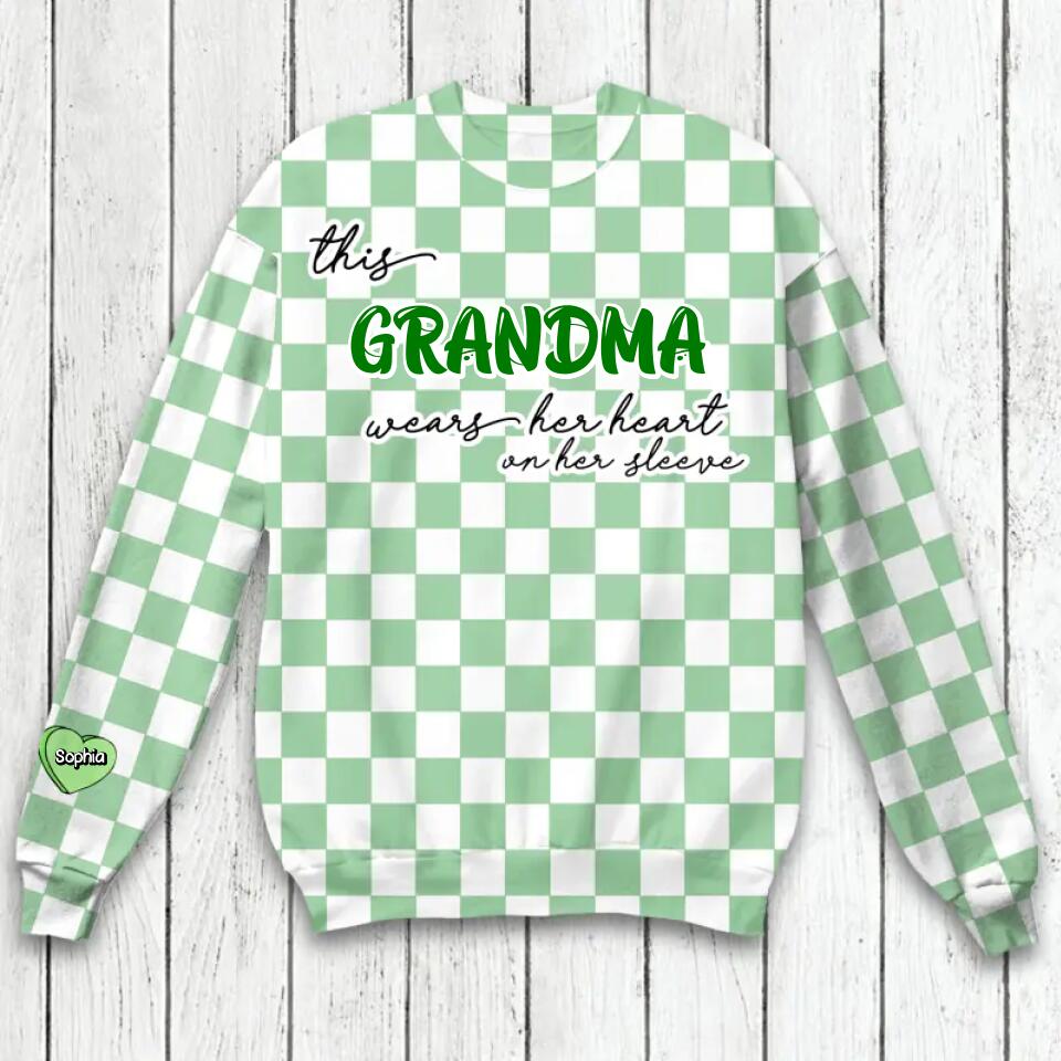 Personalized This Grandma Wears Her Heart On Her Sleeve Patrick Day Printed Sweatshirt QTHQ1002
